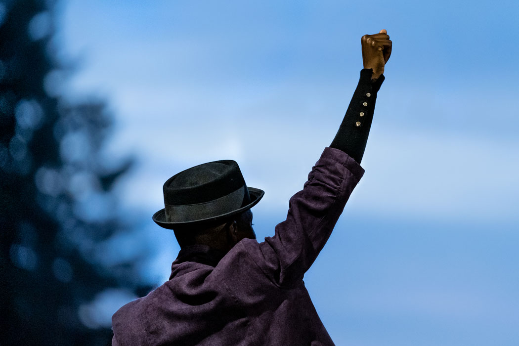 Picture of a man raising his fist